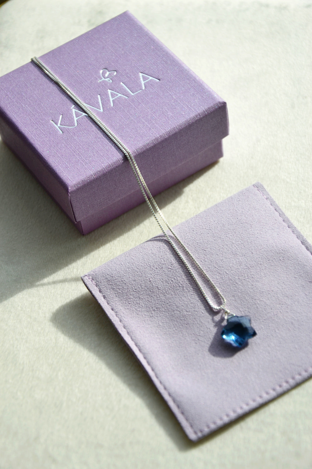 Collar Estrella Topacio Azul con cadena de plata
