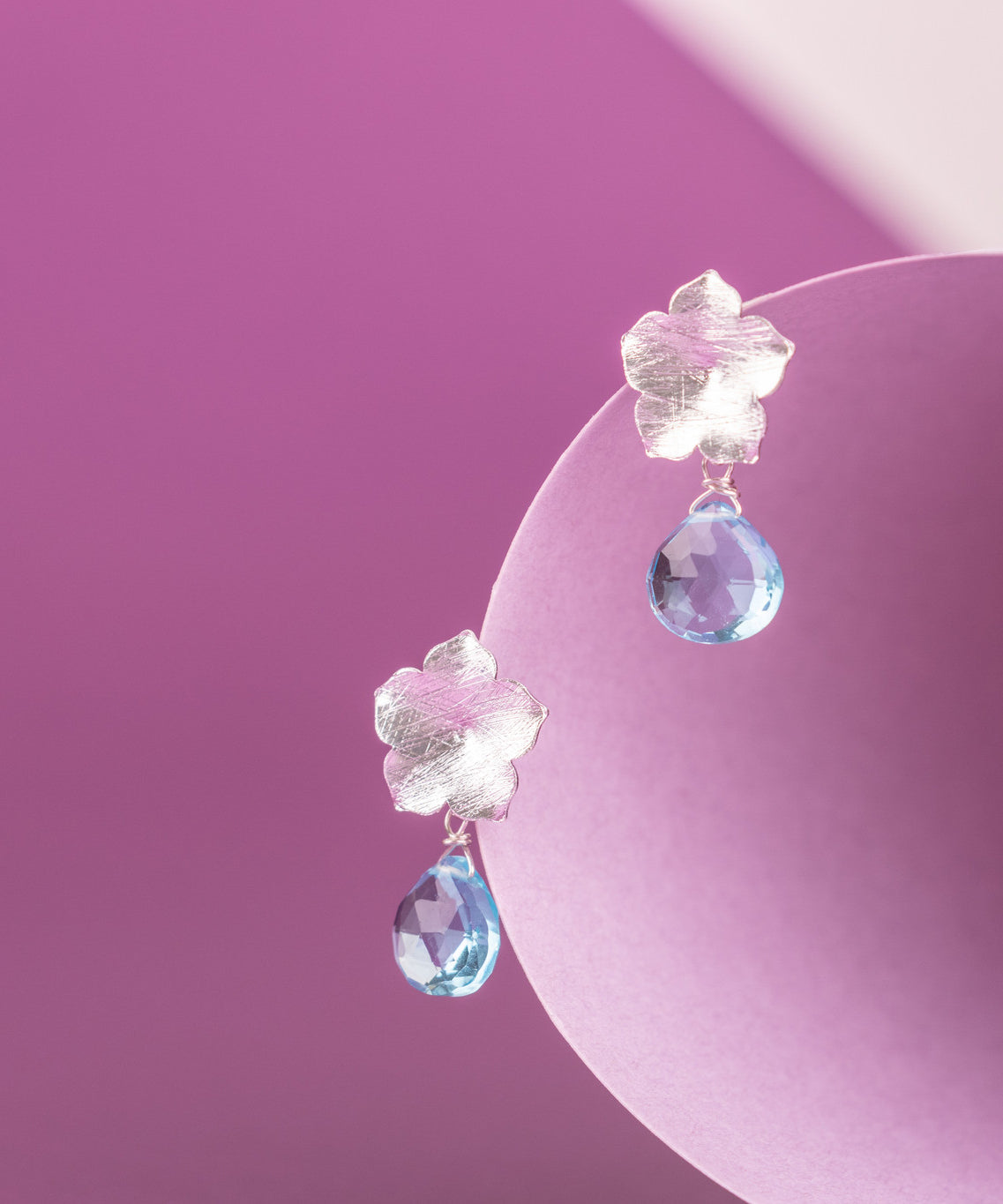 AROS FLOR DE PLATA Y TOPACIO