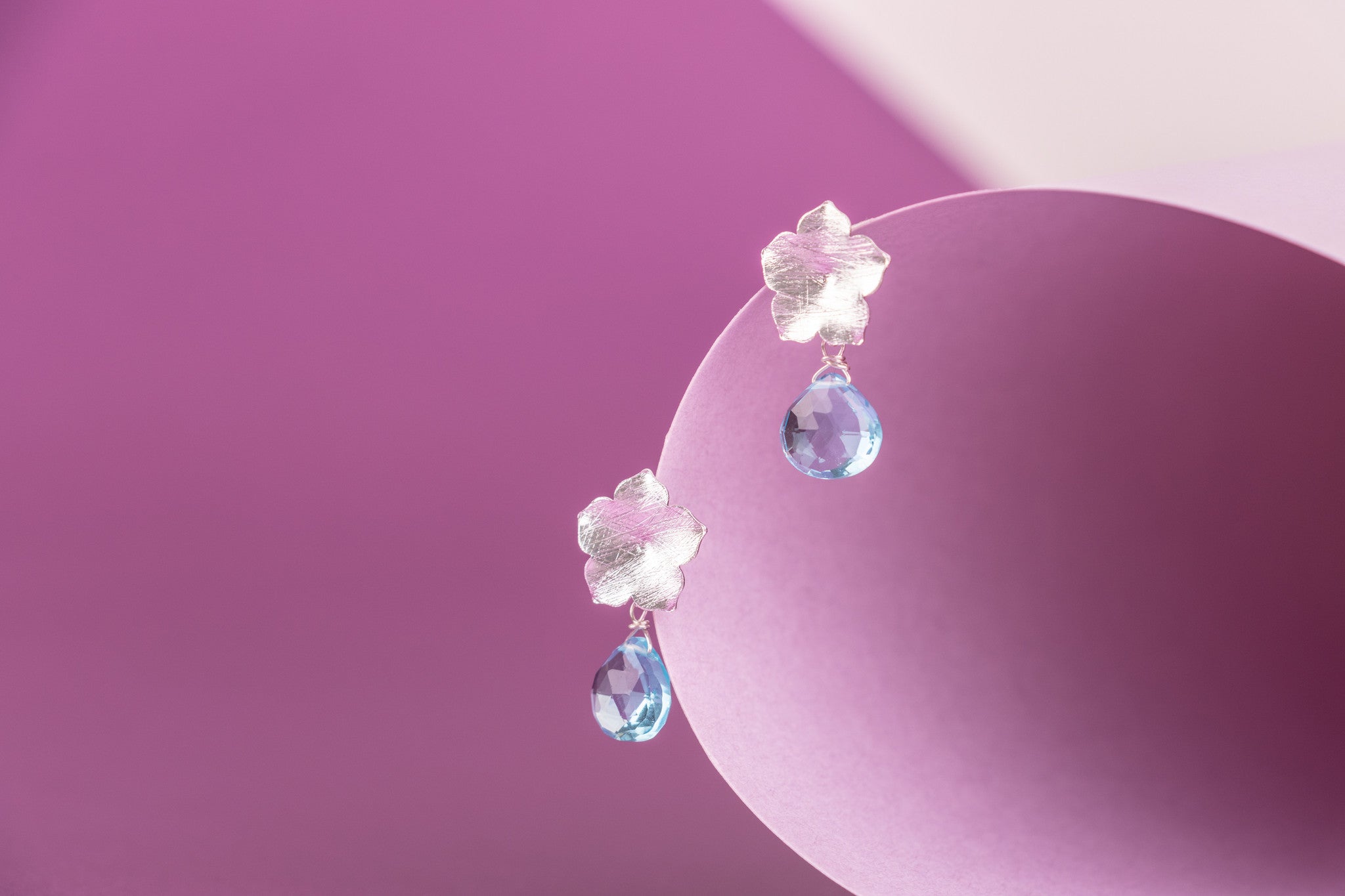 AROS FLOR DE PLATA Y TOPACIO